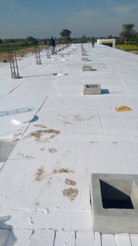 Completed insulated white roof surface with EPS sheets in Pakistan